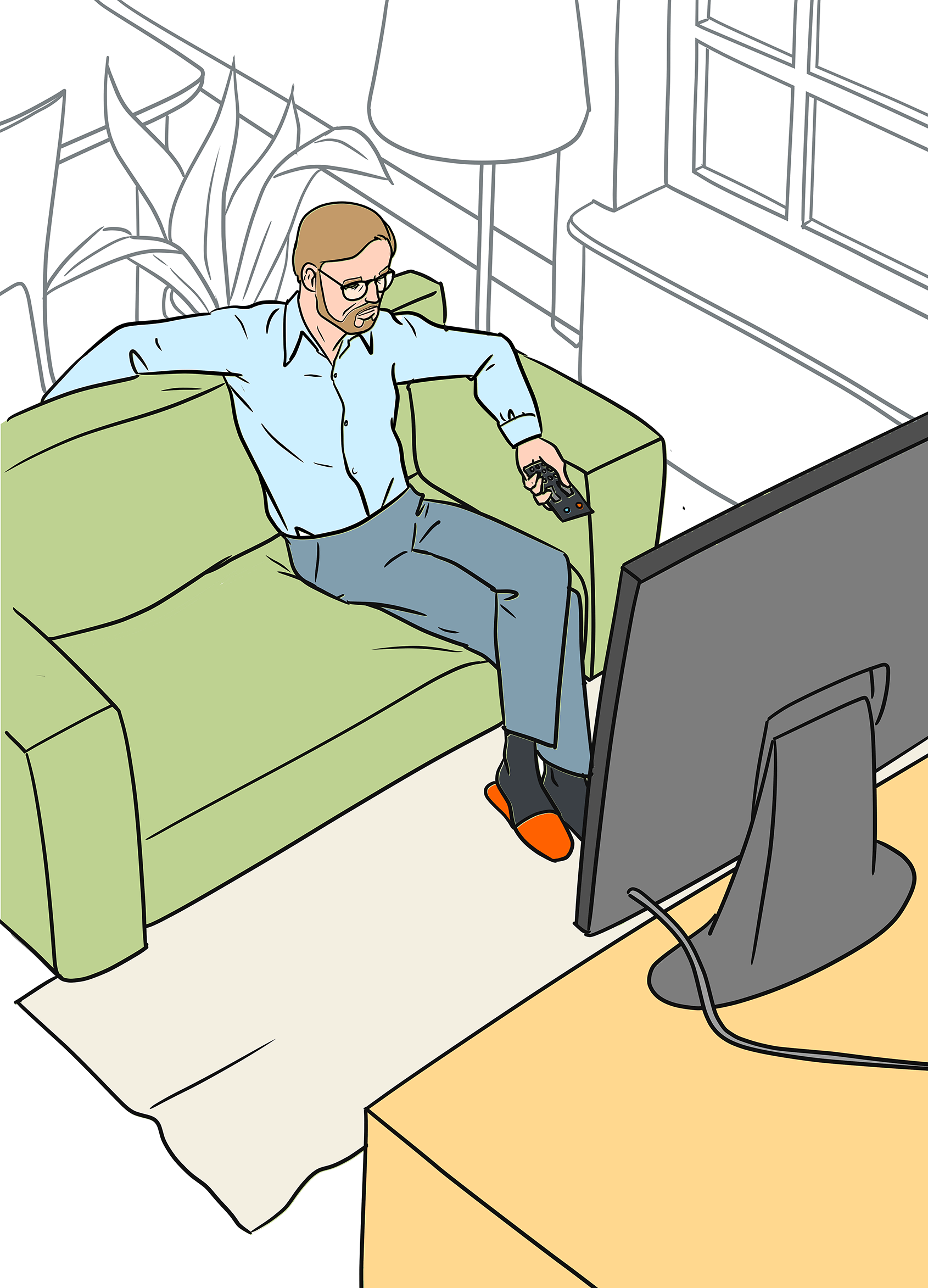 Stephan Peters sitzt auf dem Sofa und schaut Fernsehen.